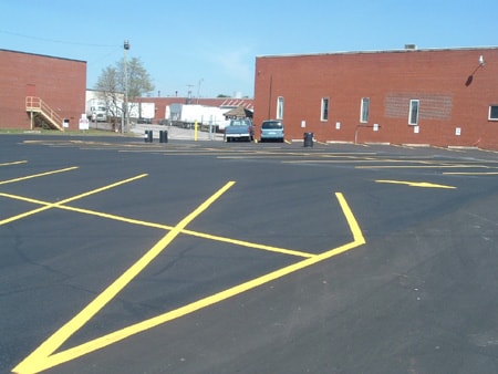Parking spaces, travel lane borders, and arrows