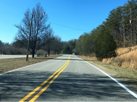 Rural road stripe and seal renewal, Lenoir NC